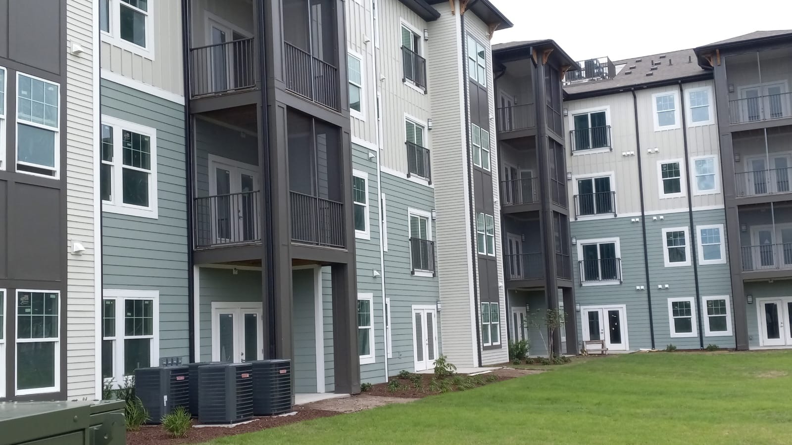 Exterior house painting and weather-resistant coatings application